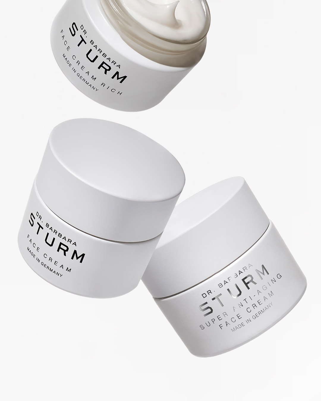 Three jars of skincare cream by Dr. Barbara Sturm.